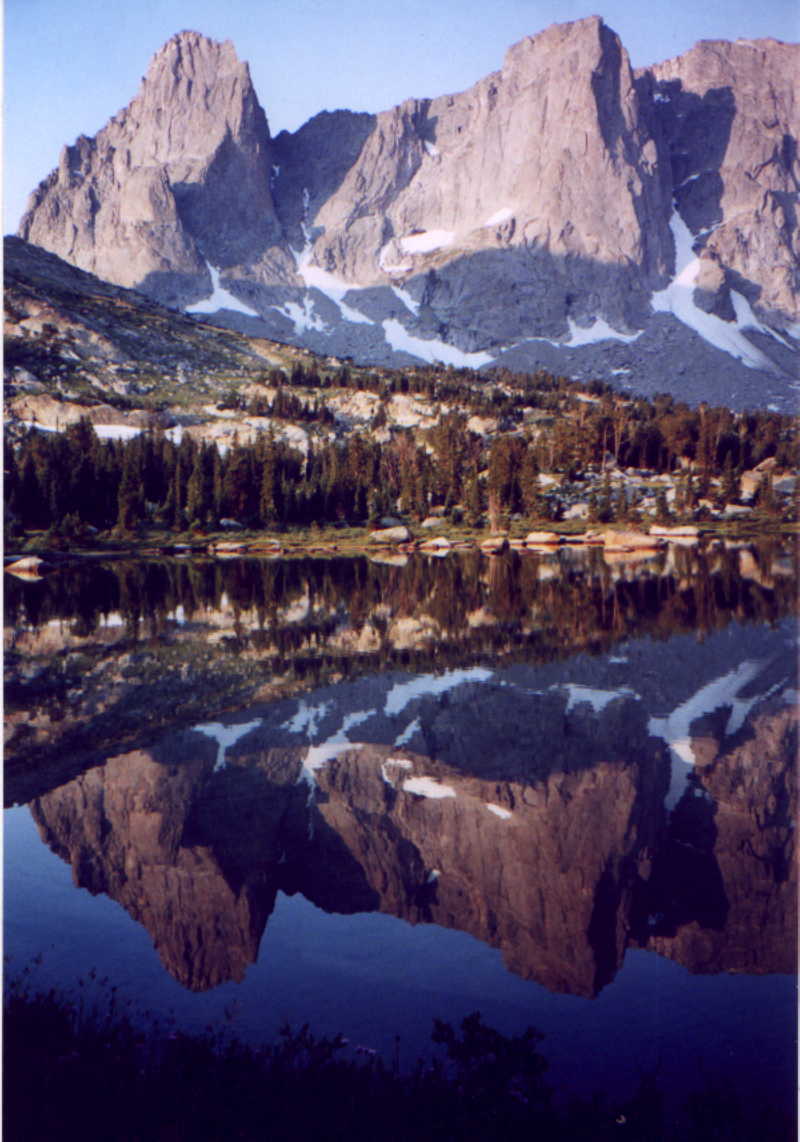 picture of Warriors I and II reflected in Lonesome Lake